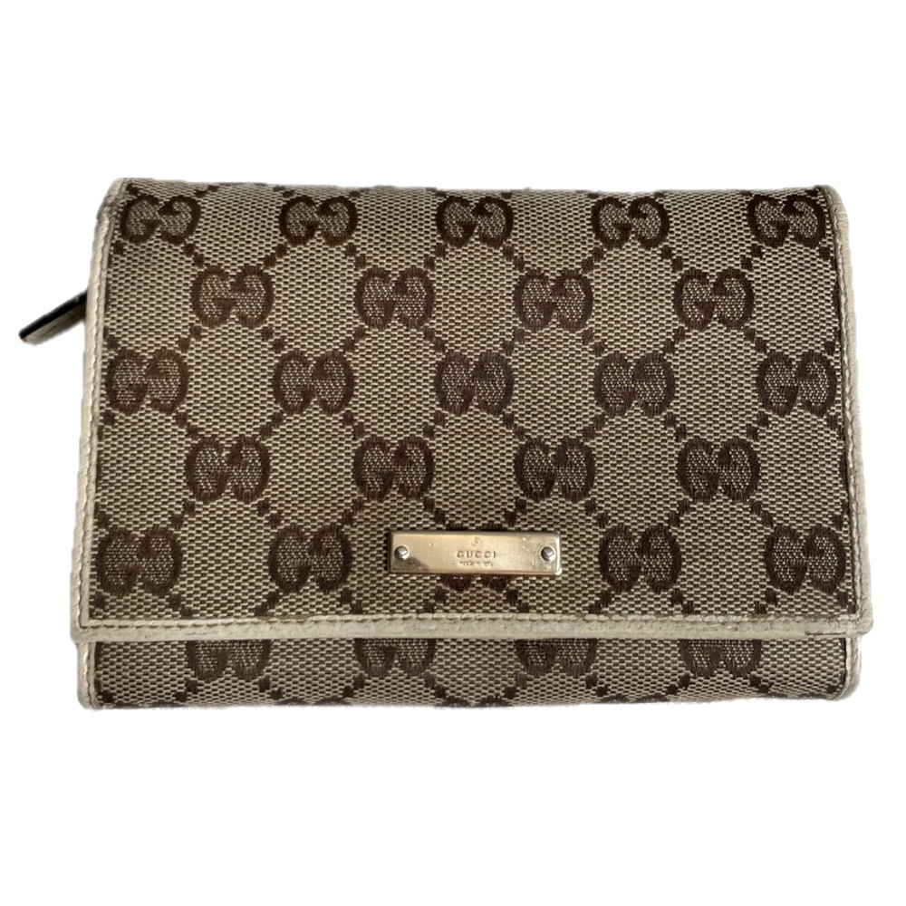 GUCCI GG Monogram Metal Bar Continental Flap
Wallet